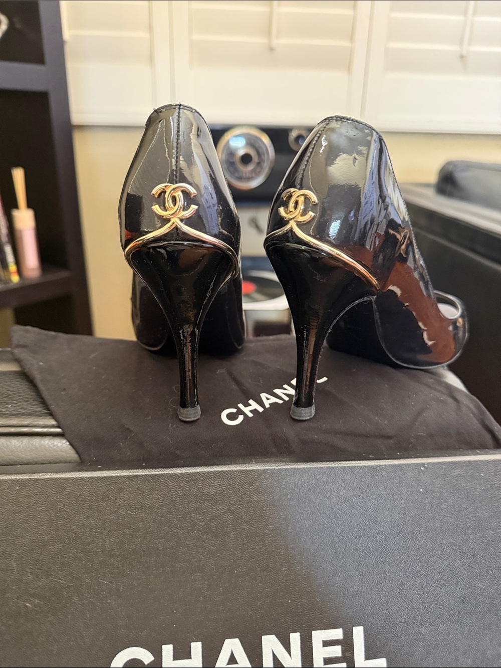 CHANEL Black Patent Peep-Toe Stiletto Pumps with Gold CC Heel Accent - Picture 4 of 10